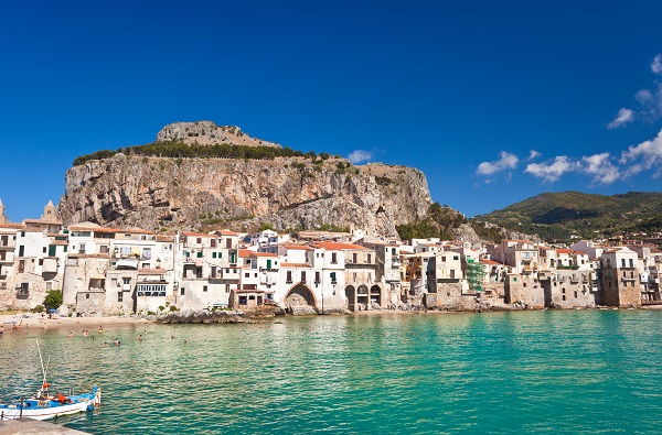 La Rocca seen from the harbour in Cefalù