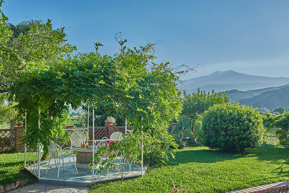 Villa Calipso, the garden with view of the Etna volcano