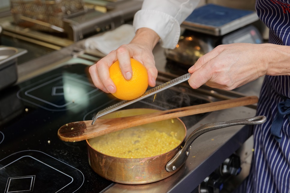 Chef is cooking fregula pasta